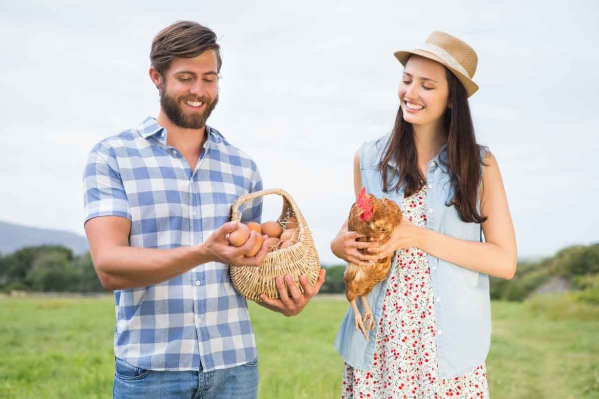 Happy couple with their chicken.